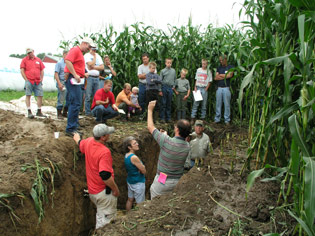 At a local farm education day, everyone learns about soil and how to protect it.